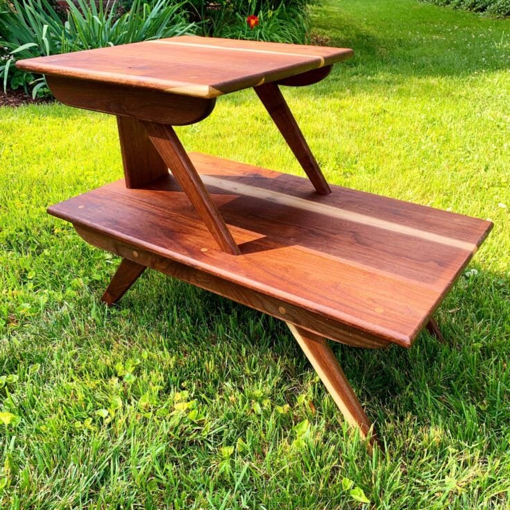 two tier modern end table in grass
