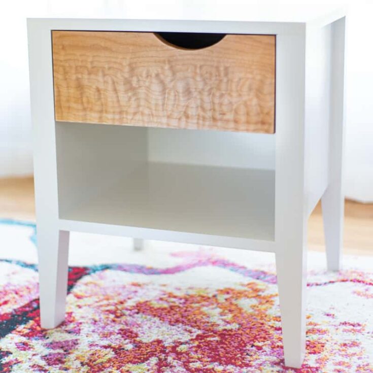 white nightstand and wood drawer