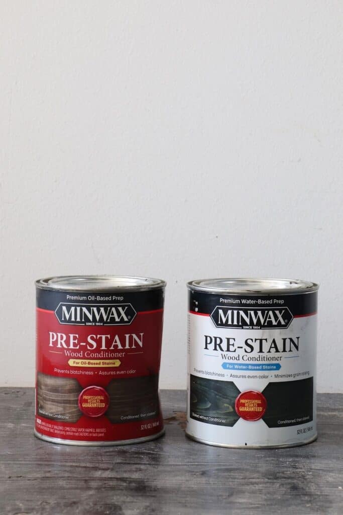 Minwax pre-stain wood conditioner for oil-based stains next to Minwas pre-stain wood conditioner for water-based stains