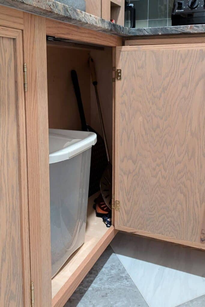 hidden storage in a corner cabinet