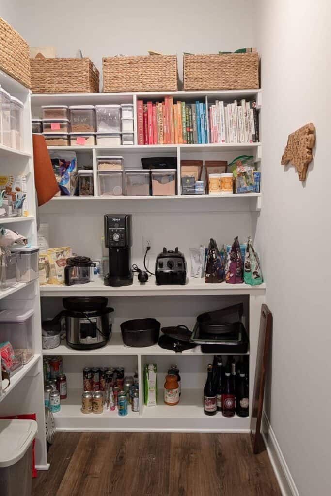 before pantry renovation with white shelving 