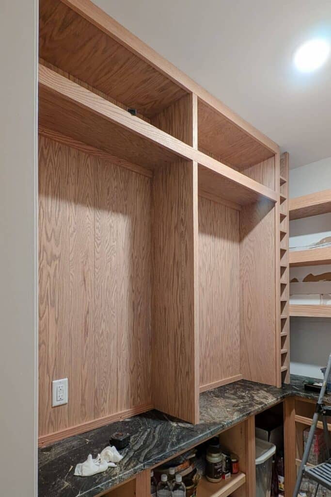 DIY hutches being installed on countertop