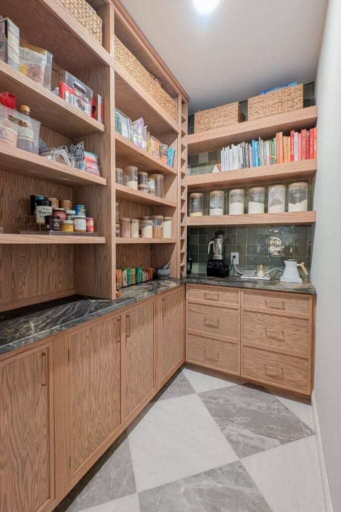 after of DIY pantry update with floor to ceiling shelving and cabinets